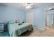 Relaxing bedroom with neutral tile floors and a closet for ample storage at 6131 Tedder St, Port Charlotte, FL 33981