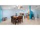 Bright dining room features a wooden table, chair set, and tile flooring at 6131 Tedder St, Port Charlotte, FL 33981