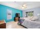 Bright main bedroom featuring a slider to the screened in patio at 6131 Tedder St, Port Charlotte, FL 33981