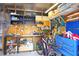 Garage with a work bench, tools, bicycles, and ample storage, perfect for hobbies and projects at 6531 Clair Shore Dr, Apollo Beach, FL 33572