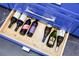 Kitchen drawer filled with wine bottles at 6531 Clair Shore Dr, Apollo Beach, FL 33572