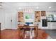 Spacious dining area next to a well-appointed kitchen, perfect for Gathering gatherings at 6531 Clair Shore Dr, Apollo Beach, FL 33572