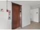 Condo elevator with wood paneling, stainless steel trim, and floor indicator at 6800 20Th N Ave # 405, St Petersburg, FL 33710