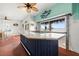 Charming bar with waterfront views, tropical decor, and a spacious counter, perfect for entertaining at 854 Bay Point Dr, Madeira Beach, FL 33708