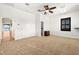 Bedroom featuring carpet floors, ceiling fan, and a glimpse of a water view at 854 Bay Point Dr, Madeira Beach, FL 33708