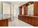 Large bathroom featuring a soaking tub, spacious counters, and detailed cabinets at 854 Bay Point Dr, Madeira Beach, FL 33708