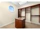 Custom closet featuring built-in shelving and ample storage space at 854 Bay Point Dr, Madeira Beach, FL 33708