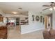 Open concept living space with dining area and stylish decor throughout at 932 Lexington Dr, Dunedin, FL 34698