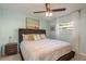 Comfortable main bedroom with soft, natural lighting and a serene atmosphere at 932 Lexington Dr, Dunedin, FL 34698