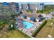 Aerial view of the community pool, clubhouse, hot tub, and lounge areas at 960 Starkey Rd # 3106, Largo, FL 33771