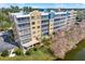 Scenic aerial view of the condo complex, with views of the lake and surrounding landscape at 960 Starkey Rd # 3106, Largo, FL 33771