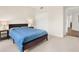 Bedroom with large window and full sized bed at 960 Starkey Rd # 3106, Largo, FL 33771