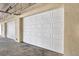 Spacious white garage doors providing secure parking and storage at 960 Starkey Rd # 3106, Largo, FL 33771