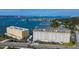 Aerial view of waterfront condos with boat docks, close to the city, and convenient parking at 100 Bluff View Dr # 514A, Belleair Bluffs, FL 33770