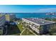 This is an aerial view of the condominium complex near the water at 100 Bluff View Dr # 514A, Belleair Bluffs, FL 33770