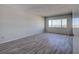 This bedroom features new floors, fresh paint and lots of natural light at 100 Bluff View Dr # 514A, Belleair Bluffs, FL 33770