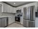 Modern updated kitchen featuring stainless steel appliances, ample cabinet space, and a clean, sleek design at 100 Bluff View Dr # 514A, Belleair Bluffs, FL 33770