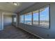 Living room with wood floors and stunning view of the cityscape and the water at 100 Bluff View Dr # 514A, Belleair Bluffs, FL 33770