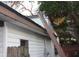 Side view of the house shows the roof and exterior at 10554 116Th N Ave, Largo, FL 33773