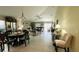 Bright living area with a smooth transition to the dining area, offering comfortable living at 10854 Sage Canyon Dr, Riverview, FL 33578