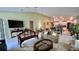 Inviting living room showcasing neutral tones, and an open layout into the dining and kitchen at 10854 Sage Canyon Dr, Riverview, FL 33578