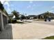 Neighborhood street view featuring well-maintained homes and landscaping at 10854 Sage Canyon Dr, Riverview, FL 33578