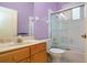 Bathroom featuring a single vanity and shower with a glass door at 1115 Signature Dr, Sun City Center, FL 33573