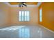 Tile flooring, neutral paint, natural light streaming through window shutters at 1115 Signature Dr, Sun City Center, FL 33573