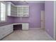 Bright home office space featuring built-in shelving and a spacious workspace at 1115 Signature Dr, Sun City Center, FL 33573