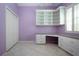 Home office with built-in desk, storage cabinets and tile floors at 1115 Signature Dr, Sun City Center, FL 33573