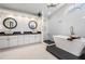 Elegant bathroom with double vanity sinks, a modern soaking tub, and a separate walk-in shower at 1123 Hounds Run, Safety Harbor, FL 34695