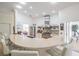 Bright, modern kitchen with stainless steel appliances, breakfast bar and outdoor access at 1123 Hounds Run, Safety Harbor, FL 34695