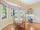 Charming breakfast nook offers natural light, a built-in desk, and views of the outdoors at 11806 Willow Point Way, Tampa, FL 33618