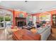 Spacious living room featuring a fireplace, and hardwood floors at 11806 Willow Point Way, Tampa, FL 33618
