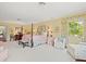Bright and spacious main bedroom with comfortable seating and large windows at 11806 Willow Point Way, Tampa, FL 33618