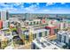 An aerial view showing the cityscape featuring modern residential buildings and the surrounding urban environment at 1208 E Kennedy Blvd # 1017, Tampa, FL 33602