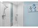Modern bathroom with glass enclosed shower and decorative tile accents at 1208 E Kennedy Blvd # 1017, Tampa, FL 33602