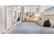 Inviting bedroom showcasing a cozy bed, stylish pillows, and a glimpse of the kitchen and living area at 1208 E Kennedy Blvd # 1017, Tampa, FL 33602