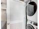 Efficient laundry area with modern stackable washer and dryer units at 1208 E Kennedy Blvd # 1017, Tampa, FL 33602