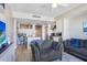 Open-concept living space with kitchen, living room, and desk area at 1208 E Kennedy Blvd # 1017, Tampa, FL 33602