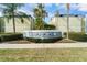 1301 SoHo community sign is surrounded by lush, manicured greenery at 1301 S Howard Ave # C10, Tampa, FL 33606