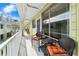 A relaxing outdoor patio area with comfortable seating is outside Unit 10 at 1301 S Howard Ave # C10, Tampa, FL 33606