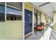 A relaxing outdoor patio area with comfortable seating at Unit 10 at 1301 S Howard Ave # C10, Tampa, FL 33606