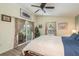 Relaxing bedroom with access to a screened lanai and ample natural light at 1312 Gulf Rd, Tarpon Springs, FL 34689