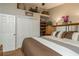 Bedroom featuring large bed, double closet, and natural light at 1312 Gulf Rd, Tarpon Springs, FL 34689