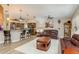 Open concept living area with kitchen bar and spacious seating at 1312 Gulf Rd, Tarpon Springs, FL 34689