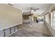 Open-concept living and kitchen area with tile flooring and natural light at 1431 54Th Ne Ave, St Petersburg, FL 33703