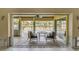 Outdoor patio with furniture overlooking the pool and fenced yard at 1431 54Th Ne Ave, St Petersburg, FL 33703