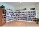 Community library with floor to ceiling bookshelves to support the community's love of reading at 14490 Passage Way, Seminole, FL 33776