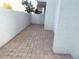 Private patio space with brick pavers, perfect for outdoor seating or relaxation in a tranquil setting at 2623 Seville Blvd # 111, Clearwater, FL 33764